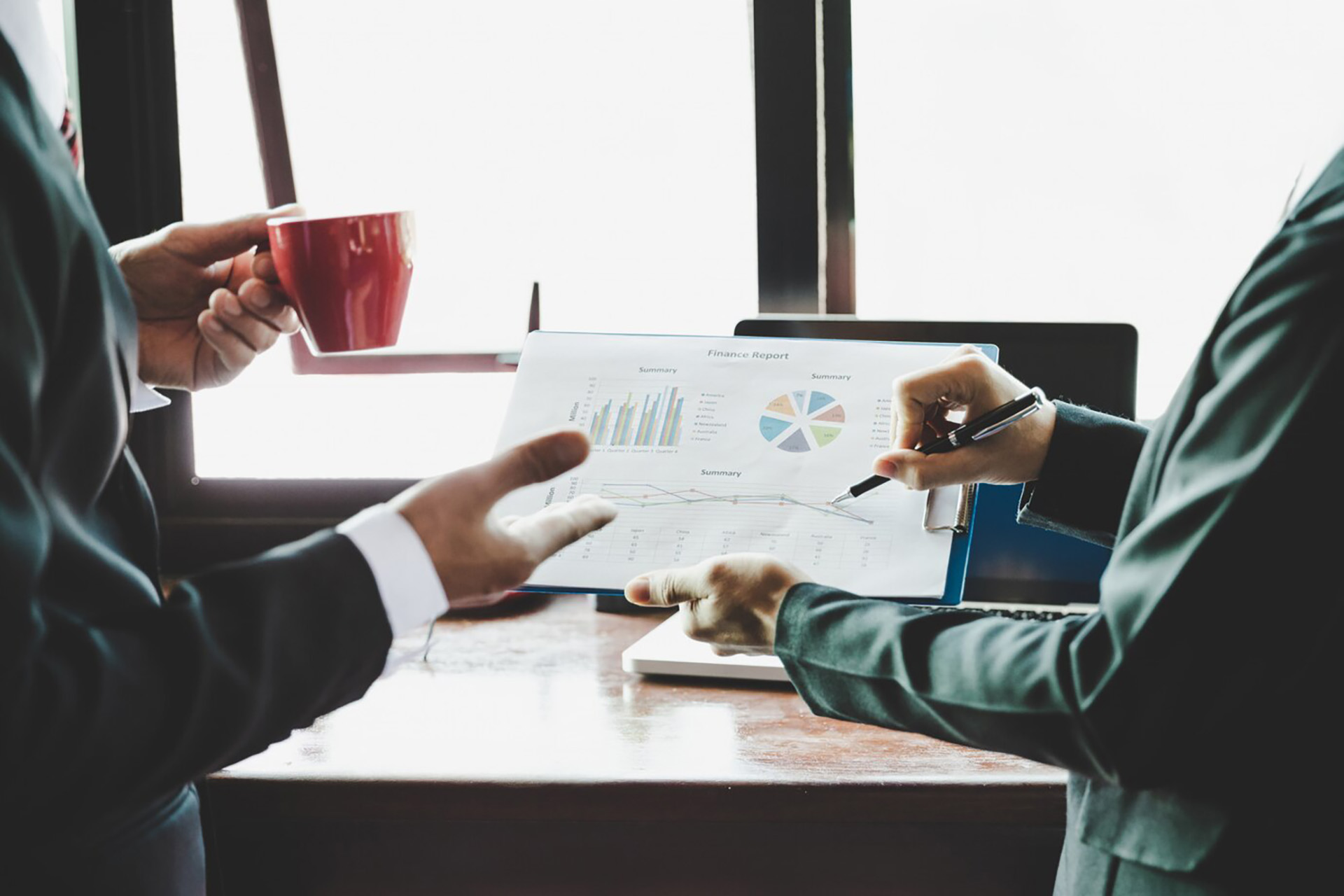 business-team-analyzing-income-charts-graphs_1150-9101